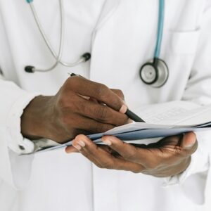 Doctor taking notes